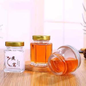 Precio de fábrica de cristal opaco bebé mano de oro en forma de frasco de vidrio de miel transparente - Product Image 5