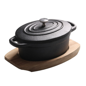 <span class=keywords><strong>Mini</strong></span> <span class=keywords><strong>olla</strong></span> de cocina ovalada de 14cm con base de madera, utensilios de cocina, cazuela de <span class=keywords><strong>hierro</strong></span> <span class=keywords><strong>fundido</strong></span> - Product Image 1