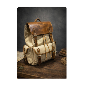 กระเป๋าเป้สะพายหลังหนังแท้และผ้าแคนวาสสุดหรู ดีไซน์ทันสมัย ทนทาน เหมาะสำหรับการเดินทางแบบมืออาชีพและการใช้งานในชีวิตประจำวัน - Product Image 1