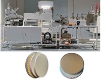 Fabricant de machines automatiques pour le bordage de rubans sur tambours à gâteaux en carton ondulé