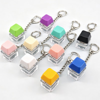 Jouet anti-stress pour clavier, porte-clés anti-stress pour clavier, bouton classique Macaron à presser avec anneau porte-clés, poppers anti-stress pour soulager le stress et l'anxiété