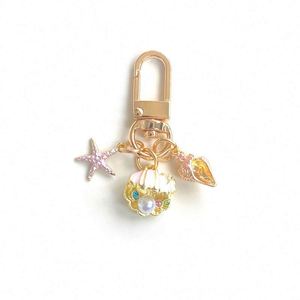 Nouveau porte-clés OCean Little Pearl Shell Starfish Conch, accessoires simples, mini pendentif de sac, porte-clés - Product Image 5
