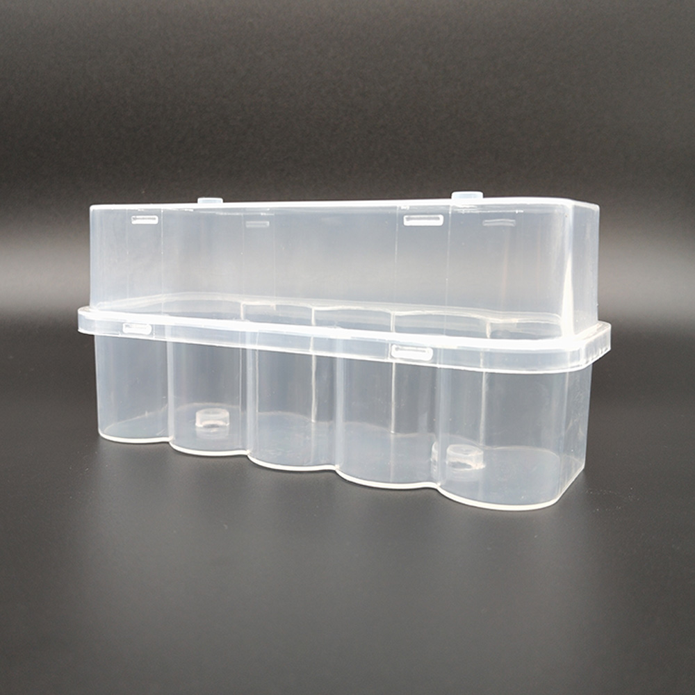 Caja transparente para 10 viales de 10 ml cada uno.