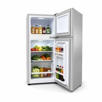 Réfrigérateur moderne à double porte avec congélateur supérieur, compact, 78L, idéal pour les petites familles et appartements