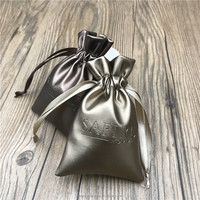 Pochette de parfum cosmétique en cuir pu avec cordon de serrage logo Deboss Sac en cuir marron métallique durable pour bijoux