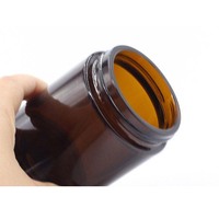 Pots en verre de qualité alimentaire pour crème de soin de la peau 500ml 270ml 250ml 180ml 120ml pots de bougie ambrés à face droite.
