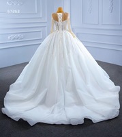 Feishiluo robe de mariée de luxe pour femmes robe de bal ivoire en gros avec manches longues paillettes et décorations florales en organza