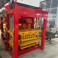 Machine à fabriquer des blocs de béton entièrement automatique QT4-15 Xinkeda avec pompe PLC, machine à briques en ciment hydraulique, prix d'usine