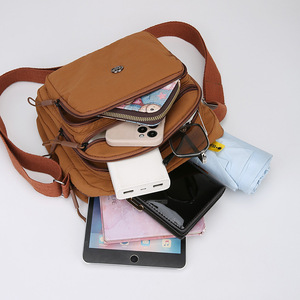กระเป๋าสะพายข้างผู้หญิง LJDS39 สีคาราเมล ทรงสี่เหลี่ยมแนวนอน ปิดซิป มีช่องใส่โทรศัพท์หลายชั้น ทนทาน ใช้ได้ทุกวัน - Product Image 1