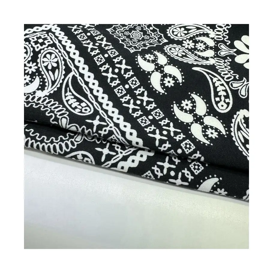 Custom 170gsm Soft White Printed Polyester Spandex Fabric On Black Background For Dress