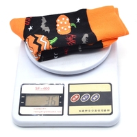 Vente en gros de chaussettes d'Halloween pour femmes Chaussettes punk noires et orange en coton drôle