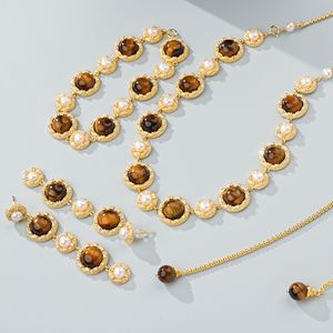 Горячая распродажа <span class=keywords><strong>2026</strong></span>: Новый оригинальный дизайн, ювелирный набор из тигрового глаза и жемчуга, с блестящим золотым покрытием, женское ожерелье, браслет, серьги, модный аксессуар для вечеринок - Product Image 1