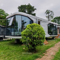 Maisons d'hôtel modernes Maison en conteneur préfabriquée Conception de capsule spatiale Construction rapide avec cadre et matériau en acier