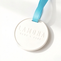 Diffuseur d'huiles essentielles en céramique ronde personnalisé pour voiture, parfum d'ambiance de luxe en gros, logo en gypse, aromathérapie