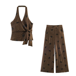 Ensemble de soirée 2 pièces de luxe pour <span class=keywords><strong>femme</strong></span>, haut à sequins col halter et pantalon large, collection 2026, fabrication OEM par usine chinoise - Product Image 1