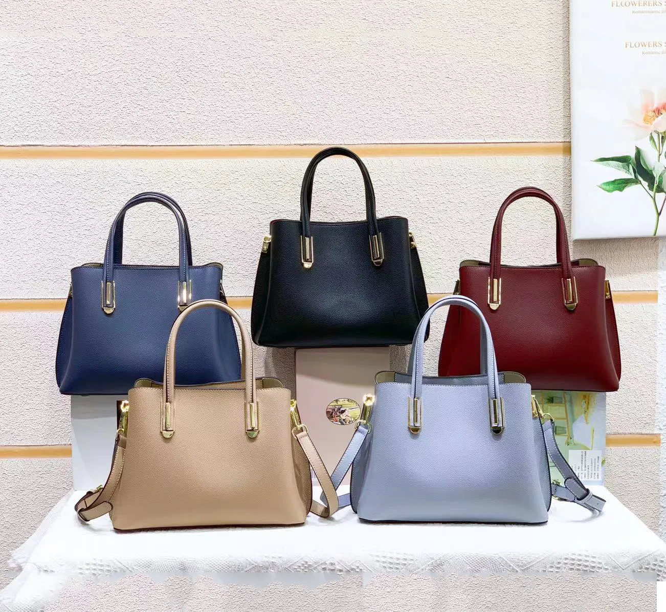 2021 중국 패션 솔리드 컬러 정품 가죽 럭셔리 여성 핸드백에서 새로운 가죽 핸드백
