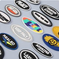 Emblème en caoutchouc PVC OEM, logo personnalisé en relief, badge 3D pour vêtements, sacs, chapeaux, uniformes, prix d'usine