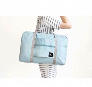 Muestra gratuita, bolsa de viaje plegable de poliéster ligera, impermeable y resistente a desgarros, con logo personalizado, para almacenamiento y fin de semana. - Product Image 3