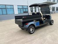 Voiturette de golf tout-terrain à haute capacité de charge pour 2 passagers avec boîte de chargement arrière et pneus tout-terrain pour utilisation en ranch et en zone touristique