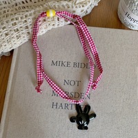 Maillard Color Series Rétro Imprimé Léopard Écharpe Collier Femmes Niche Design Chandail Chaîne Halter Accessoire pour Cou