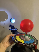 Modèle de globe terrestre en plastique à trois sphères (Soleil, Terre, Lune) avec démonstration du mouvement des 3 boules pour l'éducation sur le système solaire