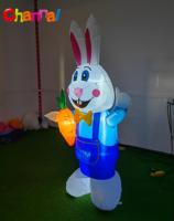 Décor gonflable de lapin de Pâques avec des carottes pour le printemps, la pelouse extérieure et le jardin
