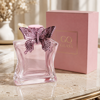 Flacon de parfum personnalisé haut de gamme pour femme avec bouchon papillon pour une présentation élégante de la fragrance d'intérieur, emballage de luxe en coffret cadeau