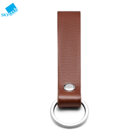 LLavero de piel auténtica clásico de diseño sencillo al por mayor, correa de mano con logotipo personalizado para regalo de promoción, producto artesanal de piel