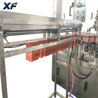 Machine de remplissage et de bouchage rotative XF entièrement automatique à double entraînement contrôlée par PLC pour sachets à bec verseur, remplisseuse de liquides et de pâtes Doypack