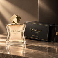 Flacon de parfum de 100 ml de forme unique, contenant de parfum en verre de luxe avec bouchon doré facetté