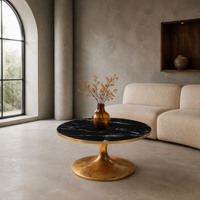 Table basse ronde en marbre noir avec piétement tulipe en feuille d'or et base en fibre de verre haute brillance, personnalisable