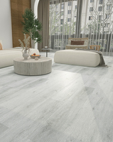 Plancher en PVC à grain de bois de luxe OEM effet parquet à coller Carrelage planches de vinyle pour la maison