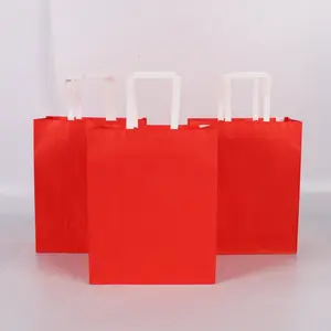 Bolsa de compras de papel Kraft rojo al por mayor, bolsa de papel artesanal impresa personalizada, bolsas de papel de embalaje coloridas con asas giratorias