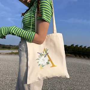 Fournisseur de toile de plage en coton pour boutique Sacs blancs à la mode pour femmes Sacs à provisions Sacs fourre-tout en toile avec logos