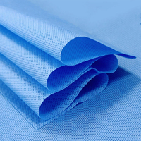 Rouleau de draps jetables en polypropylène non tissé laminé imprimé SMS coloré pour table d'examen et de massage