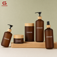Botol Plastik Amber Custom dari Produsen dengan Tutup Pompa Kayu Bambu 100ml 150ml 200ml 250ml Sablon untuk Lotion