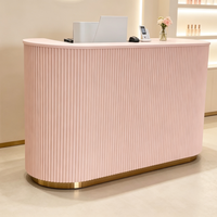 Comptoir de réception personnalisé de qualité pour magasin, en rose cannelé