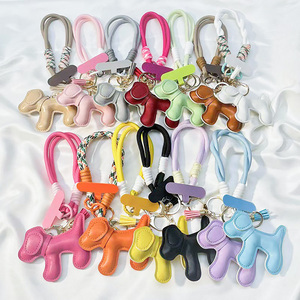 <span class=keywords><strong>Porte</strong></span>-clés créatif en cuir PU <span class=keywords><strong>avec</strong></span> <span class=keywords><strong>pompon</strong></span>, pendentif animal coloré pour téléphone, breloque pour sac à main et sac à dos - Product Image 1