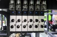 Machine de soufflage par étirage automatique pour bouteilles d'eau minérale et de boissons en PET