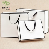 SenAng03 Chine Vente en gros sac en papier artisanal promotionnel plat imprimé personnalisé avec poignée