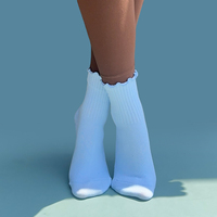 Chaussettes de sport respirantes et antidérapantes pour femmes et jeunes, idéales pour le fitness et le Pilates, avec design personnalisé, grip, effet froncé et nœuds à la bordure du bas.