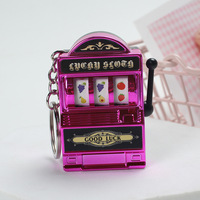 Porte-clés mini-machine à sous portable, en plastique, avec fruits, mignon, éducatif, électroplaqué, console de jeu pendentif à secouer et jouer