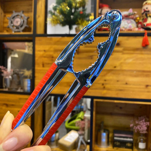 เครื่องกะเทาะเปลือกถั่วที่ใช้ในครัวเรือนมือจับสีแดงโลหะสำหรับที่เปิดเปลือกถั่วเฮเซลนัทแมคคาเดเมีย - Product Image 1