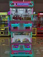 Havefun Machine à griffes combinée à LED, à monnayeur, pour jeux à prix et distributeur de bonbons, adaptée aux enfants