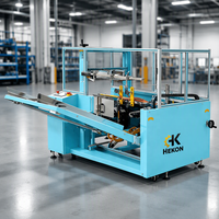 Ligne d'emballage de cartons industrielle entièrement automatique HEKON avec contrôle PLC, ouverture de cartons, pliage du fond, machine de scellage par ruban, érigeuse de cartons