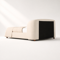 Lit double surdimensionné minimaliste européen moderne avec tête de lit incurvée, tissu doux et pieds en bois de noyer durable