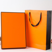 Sac en papier orange avec logo personnalisé imprimé, poignée en ruban, finition mate, luxe, pour vêtements, bijoux, vente au détail et shopping