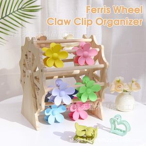 Creative wooden display rack with claw clips and hair accessories, 360-degree rotating Ferris wheel design. - Product Image 2