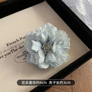 Pinza de pelo de flores de simulación al por mayor, horquilla de flores de tela de color sólido, accesorios para el cabello de vacaciones junto al mar para niñas - Product Image 5