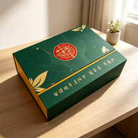 Boîte de présentation rigide de luxe écologique et recyclable avec motif de feuille dorée, texture ondulée, poignée et plateau intérieur jaune